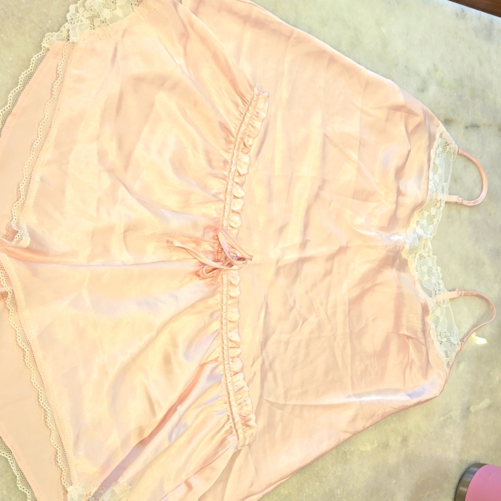 NWT satin PJs in Pink with white lace size Medium.